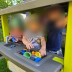 Spielen im Garten bei Däumelinchen Kindertagesplege in Essen Werden